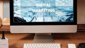 Professional reviewing digital marketing and AI strategy on a computer screen